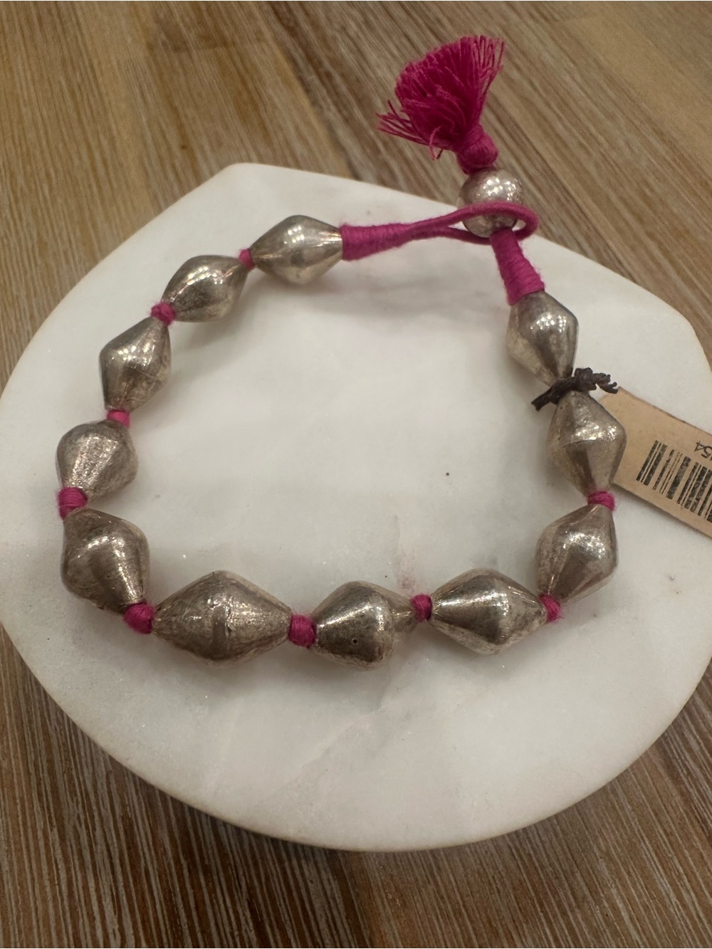 Artisanal Hot Pink Threaded Silver Biconical Bead Bracelet with Tassel
